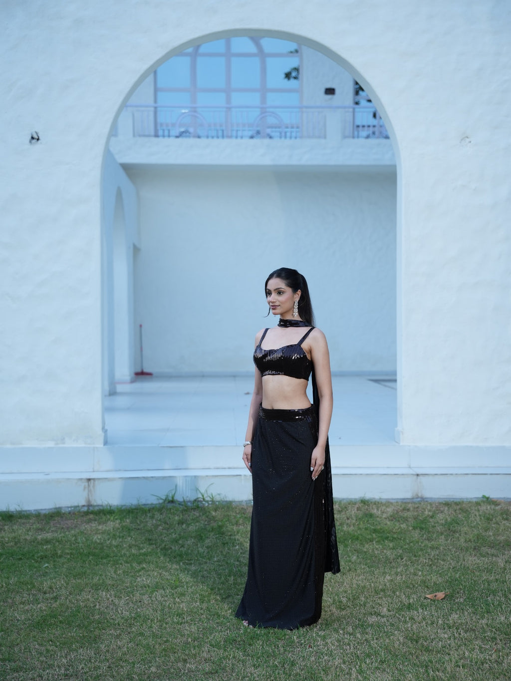 The Midnight Cocktail Crystal-embellished high-slit skirt paired with a fitted top and statement choker dupatta