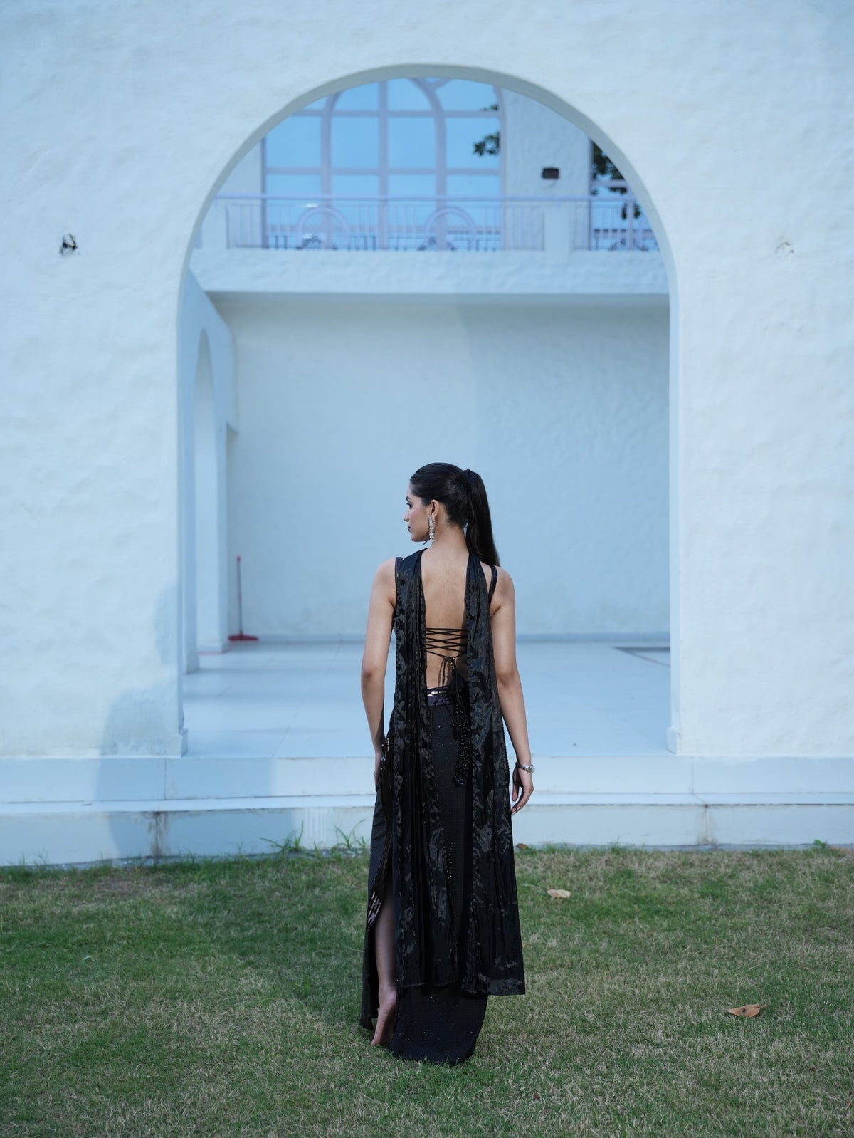 The Midnight Cocktail Crystal-embellished high-slit skirt paired with a fitted top and statement choker dupatta